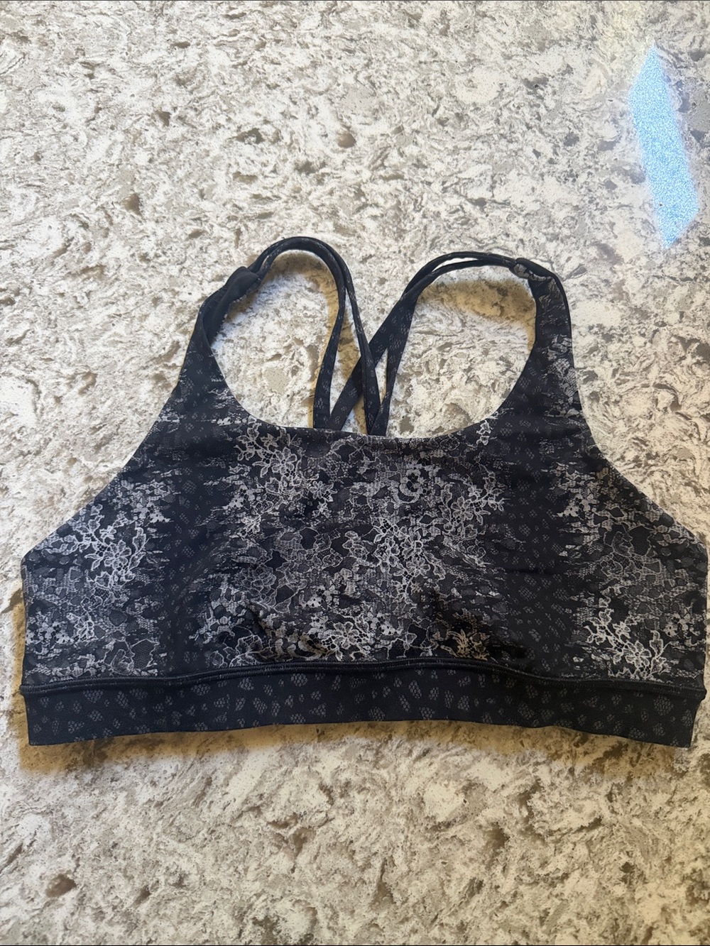 Lululemon Energy Sports Bra size 10 black with a white pattern